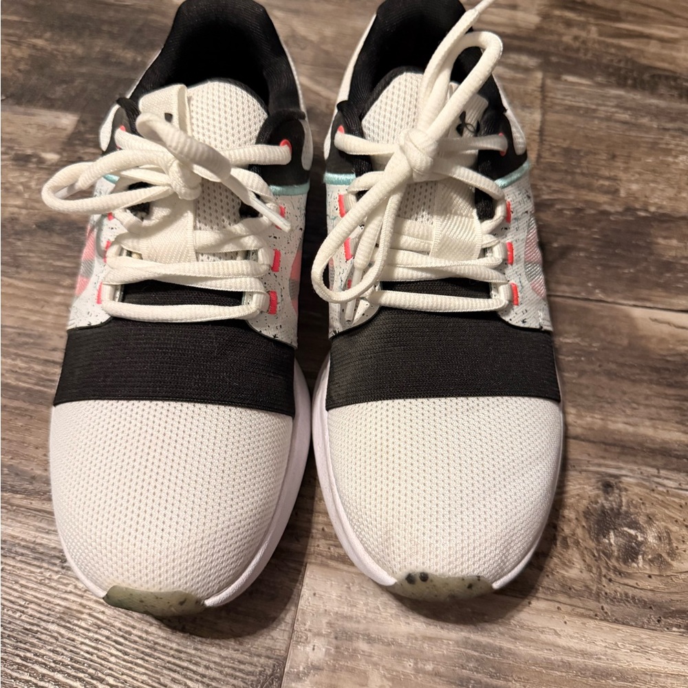 Under Armour woman’s ' Black and White Sneakers
